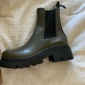 Zara never worn green boots.